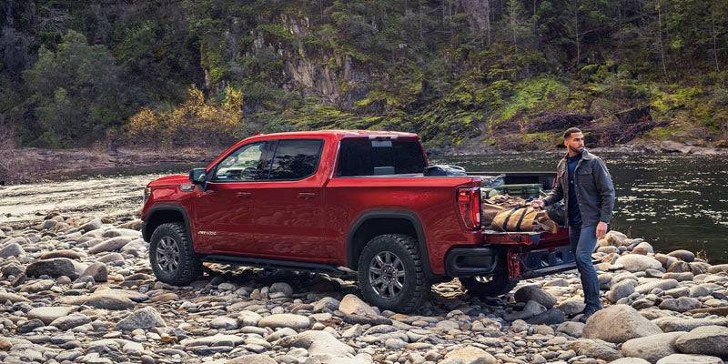 Sierra 1500 towing gear and showcasing advanced hauling capability